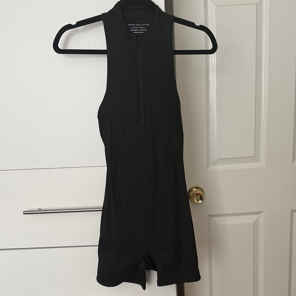 White Fox Boutique Black Sleeveless Zip-Front Jumpsuit Romper